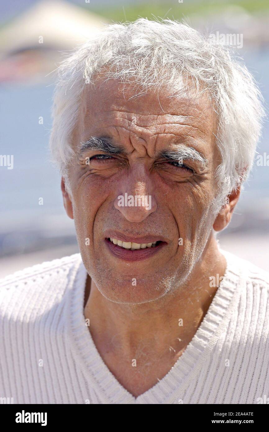 French actor and cast member Gerard Darmon poses at a photocall for the screening of Edmond Bensimon's latest film, 'Emmenez-moi', as part of the Cinestival film festival held in Marseille, southern France, on June 7, 2005. Photo by Gerald Holubowicz/ABACA. Stock Photo