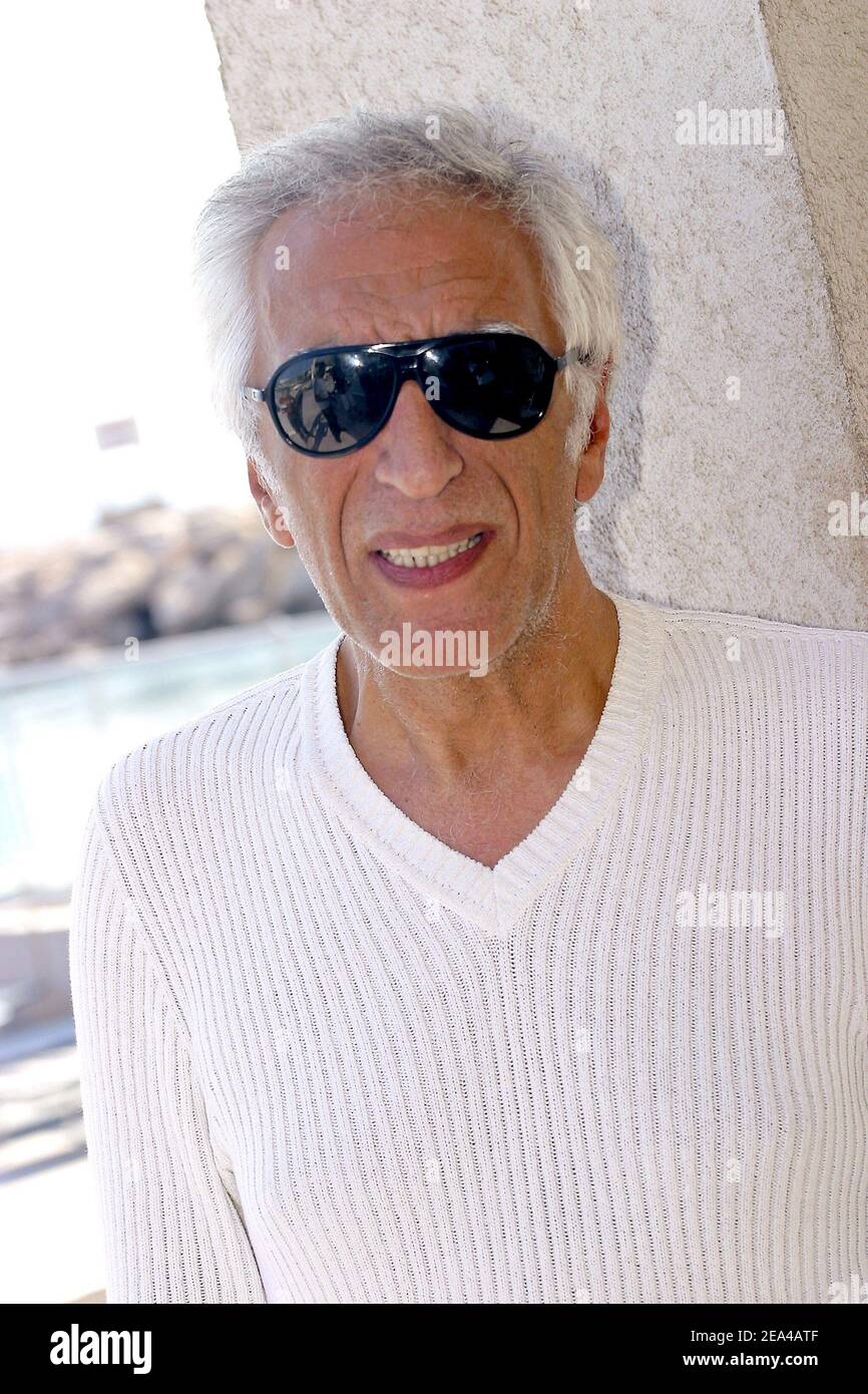 French actor and cast member Gerard Darmon poses at a photocall for the screening of Edmond Bensimon's latest film, 'Emmenez-moi', as part of the Cinestival film festival held in Marseille, southern France, on June 7, 2005. Photo by Gerald Holubowicz/ABACA. Stock Photo