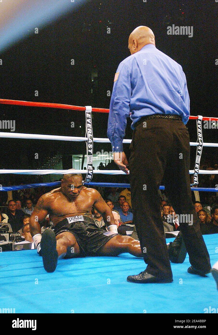 Referee, Joe Cortez looks on Mike Tyson after Ireland's Kevin McBride
