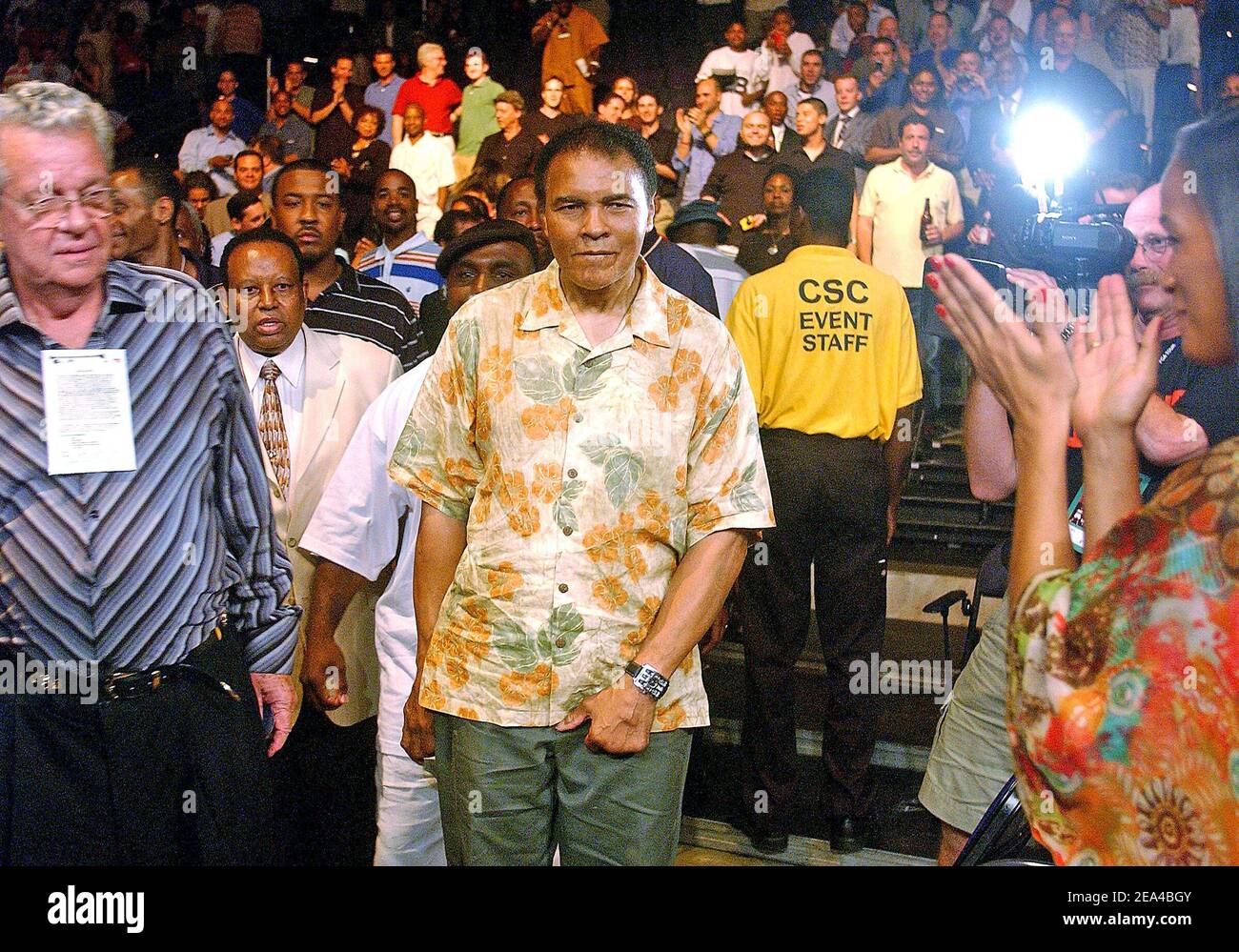 Boxing legend Muhammad Ali stepps down to the ring on June 11, 2005, in Washington, DC after congratulated his daughter Laila who won with a 3 round TKO against Erin Toughill for the WBC/WIBA Super Middleweight Championship Bout. Photo by Olivier Douliery/ABACA. Stock Photo