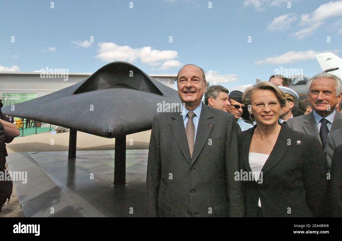 Defence minister Michele Alliot-Marie and French president Jacques Chirac stand in front of Dassault's drone, the 'Neuron' during the visit of the 46th Le Bourget Air Show, in Le Bourget, France on June 13, 2005 . Photo pool by Jacques Witt/ABACA. Stock Photo