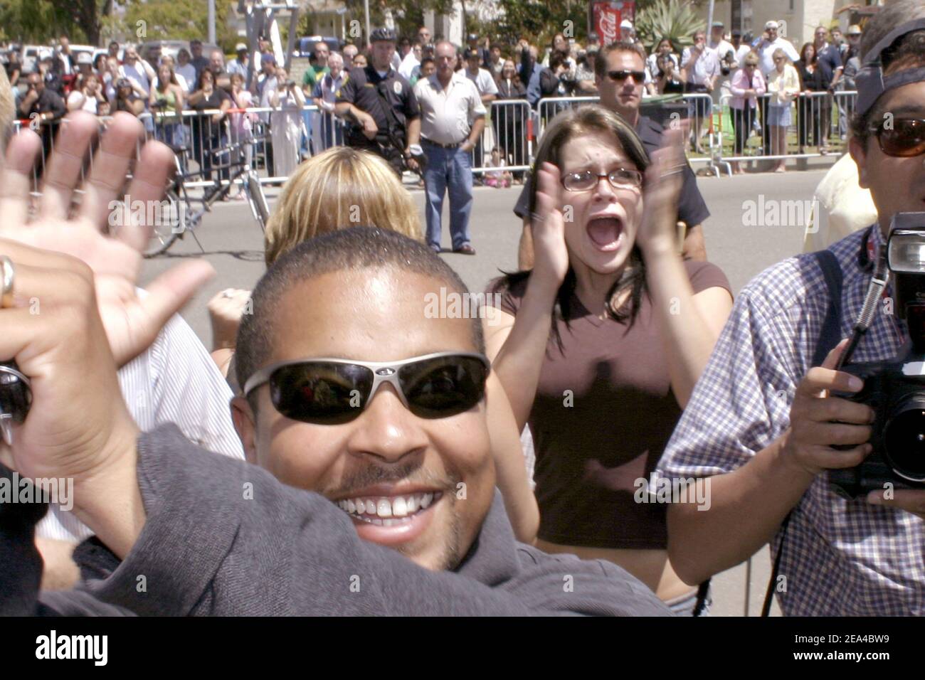Fans of Michael Jackson scream as the innocent verdict is read outside the Santa Maria, CA Courthouse on June 13, 2005. Photo By Mark Velasquez/ABACA Stock Photo