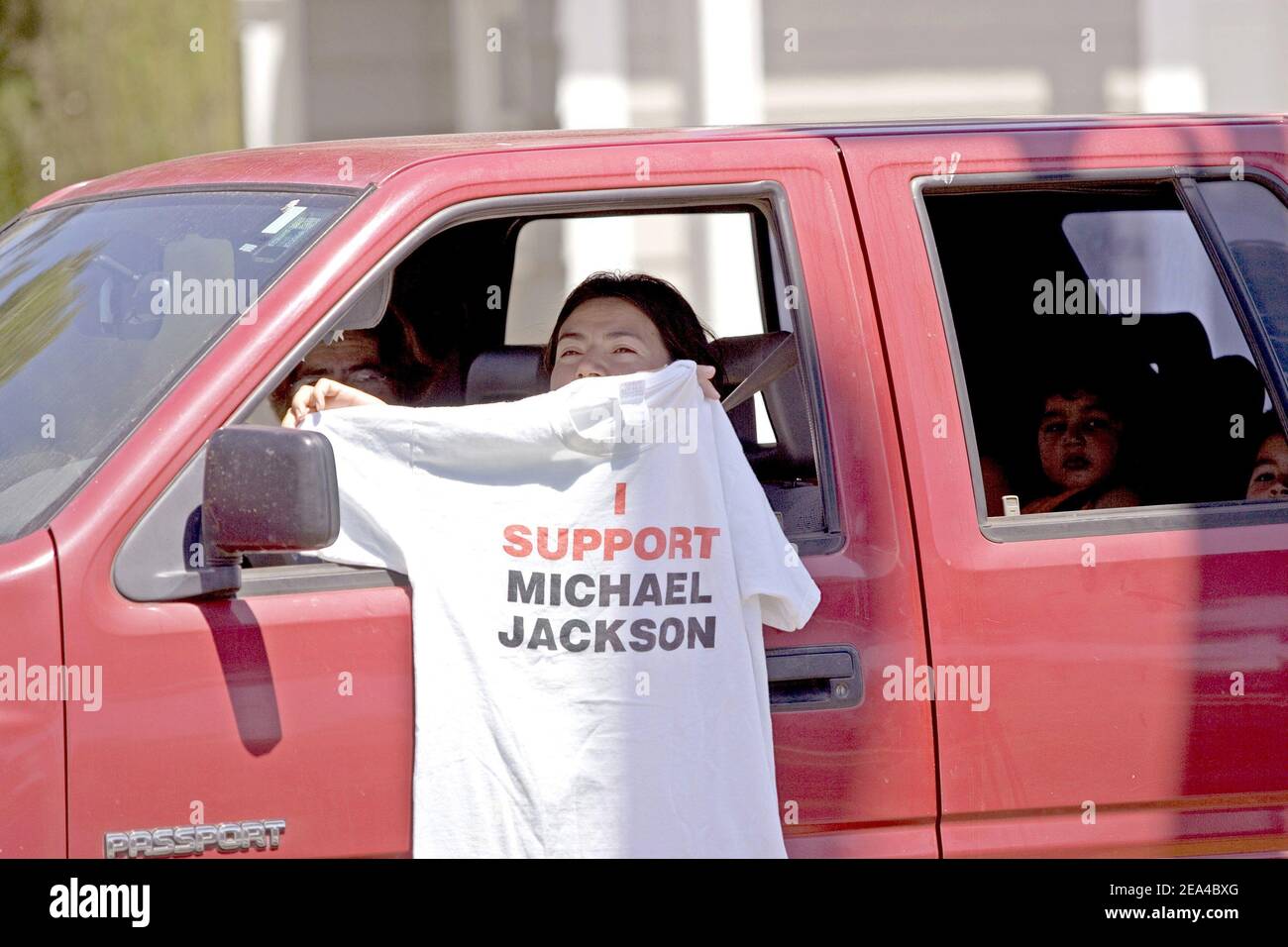 Fans outside of the courthouse in Santa Maria celebrate to the innocent verdict of Michael Jackson. Photo by Jeff Clark/ABACA. Stock Photo