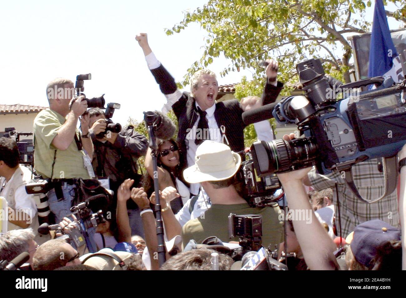 Fans of Michael Jackson cheer for the media as the final innocent verdict is read outside the Santa Maria, CA Courthouse on June 13, 2005. Photo By Mark Velasquez/ABACA Stock Photo