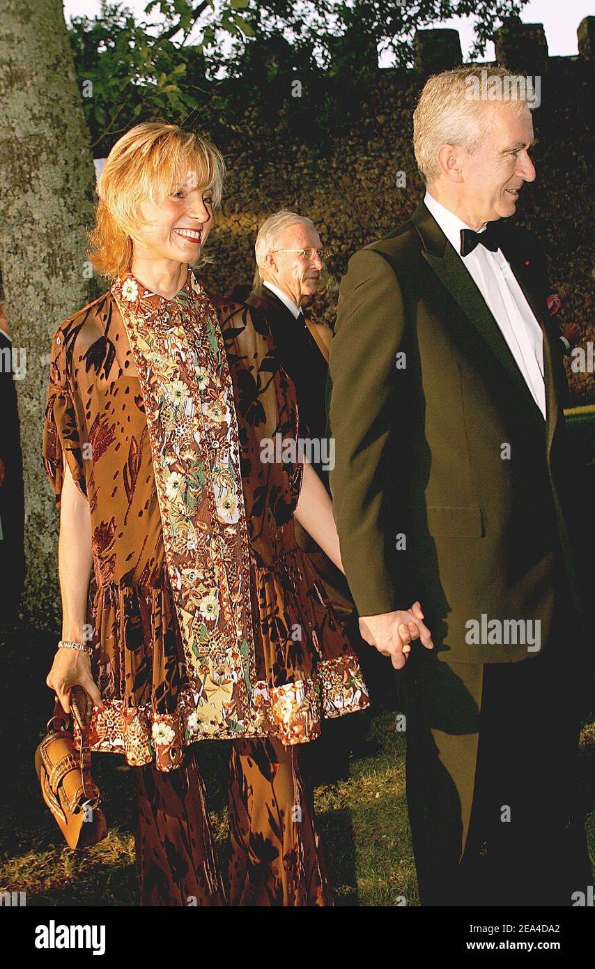 LVMH CEO and Chateau d'Yquem owner Bernard Arnault and his wife Helene pose  during a party with the owners of the 80 'Grands Crus Classes', French  great wines classified according to a