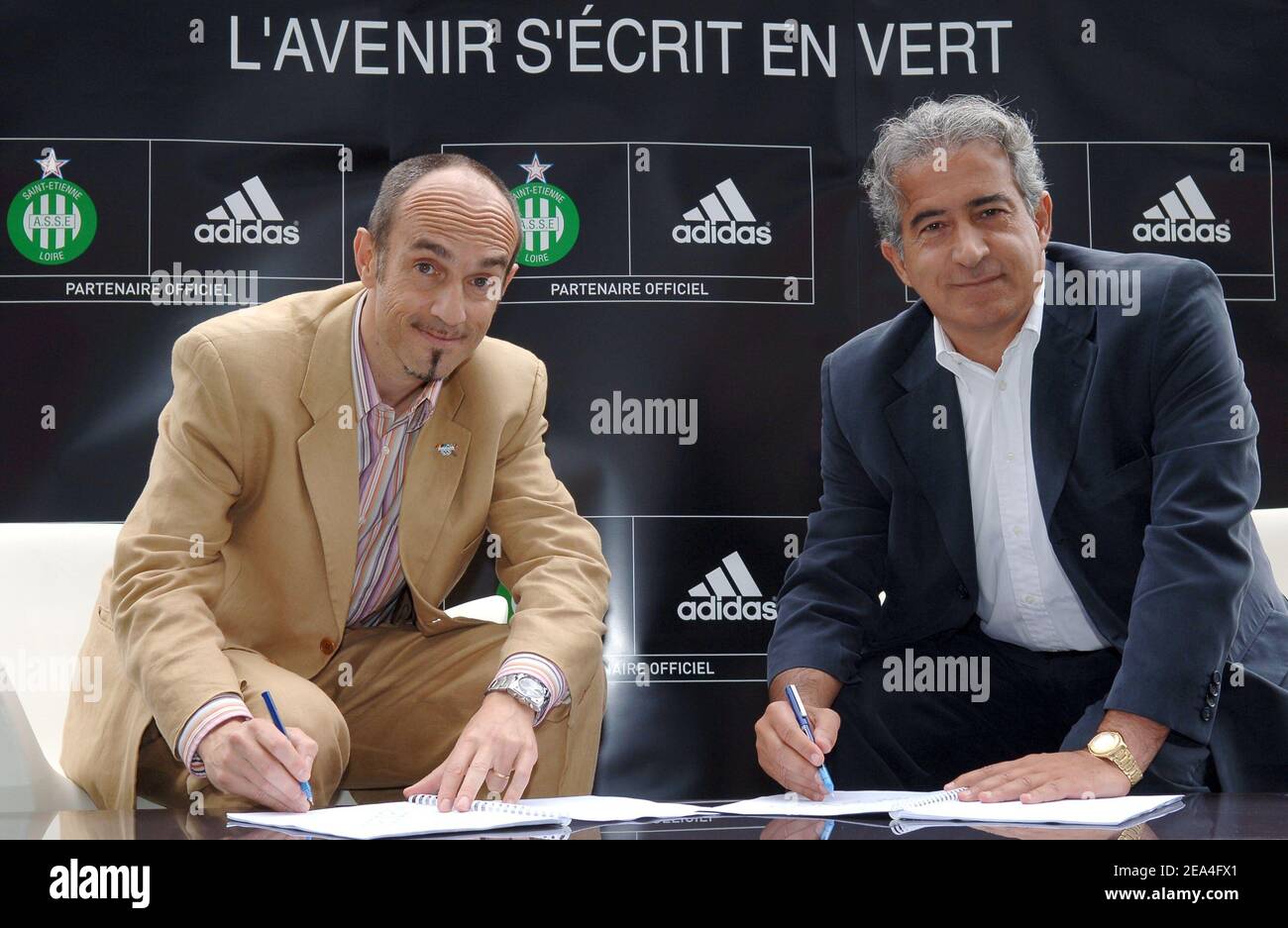 Antoine Sathicq, CEO of Adidas France and Bernard Caiazzo, President of the  'Association Sportive de Saint-Etienne' football club sign a new  partnership for five seasons, at Geoffroy Guichard stadium, in  Saint-Etienne, France,