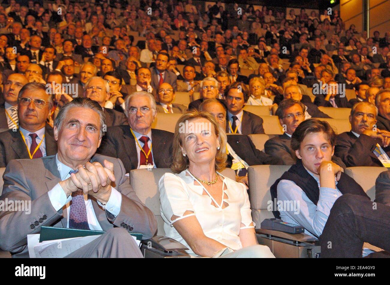 MEDEF outgoing president Ernest-Antoine Seilliere, his wife and his son during the general assembly of the French employers association held on Tuesday, July 5, 2005, in Paris, France, where Laurence Parisot, CEO of the Ifop polling institute has been appointed as its president, the first time a woman will head up the organization. Parisot, 45, received 271 votes in the first round of voting, 16 votes above the absolute majority, beating two other candidates, Yvon Jacob of mechanical engineering group Legris and Hugues-Arnaud Mayer, the president of textile company Abeil. She succeeds Ernest-A Stock Photo