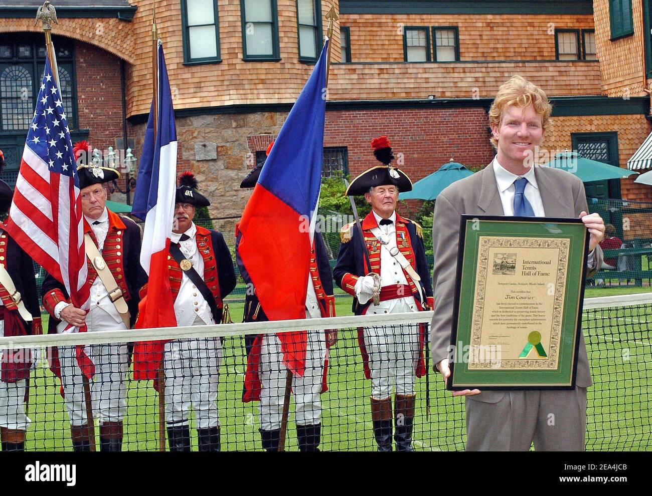 American tennis player Jim Courier poses after being inducted at the