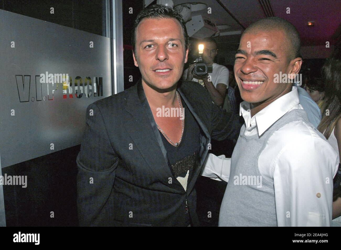 V.I.P. Room boss Jean Roch (L) poses with U.S. DJ Erick Morillo at the 'VIP  Room' in Saint-Tropez, southern France, on July 10, 2005. Photo by Benoit  Pinguet/ABACAPRESS.COM Stock Photo - Alamy