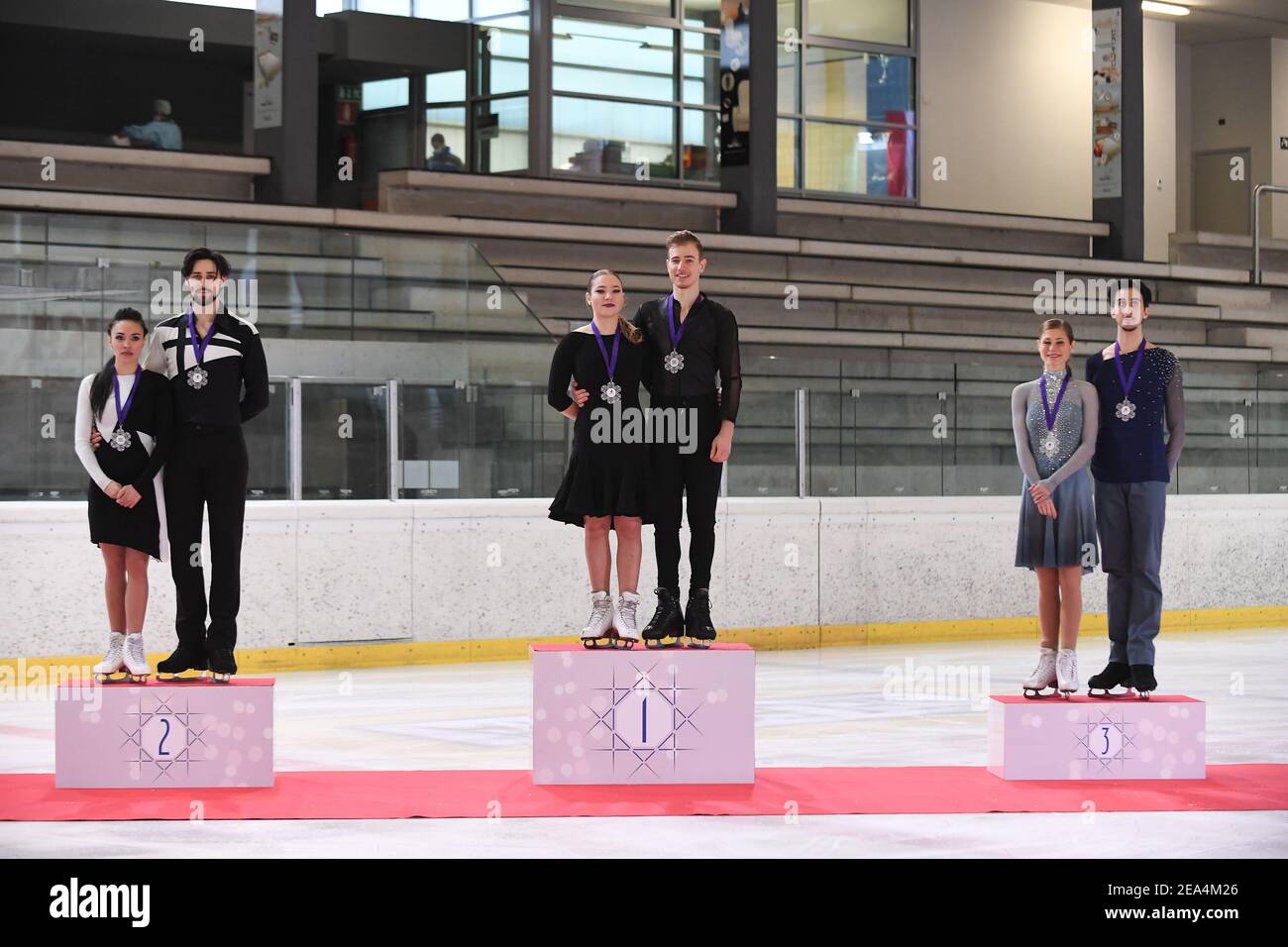 Egna/Neumarkt, Italy. 7th February, 2021. (L-R) Jennifer JANSE VAN RENSBURG & Benjamin STEFFAN from Germany, Natalie TASCHLEROVA & Filip TASCHLER from Czech Republic and Carolina MOSCHENI & Francesco FIORETTI from Italy, pose in the Senior Ice Dance medal ceremony at the ISU Egna Dance Trophy 2021 at Wurth Arena, on February 07, 2021 in Egna/Neumarkt, Italy. Credit: Raniero Corbelletti/AFLO/Alamy Live News Stock Photo