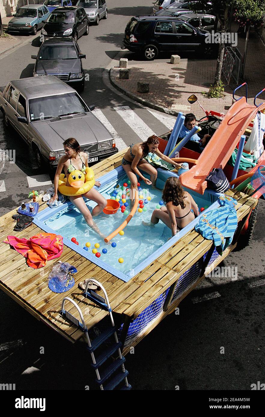 Exclusive French Artist And Mechanics Joel Tessier Aka Jojo Bulle With His Friends Agnes Cathelyne And Clara Presents His Latest Invention A Swimming Pool On Wheels In Cubnezais Southwestern France On July