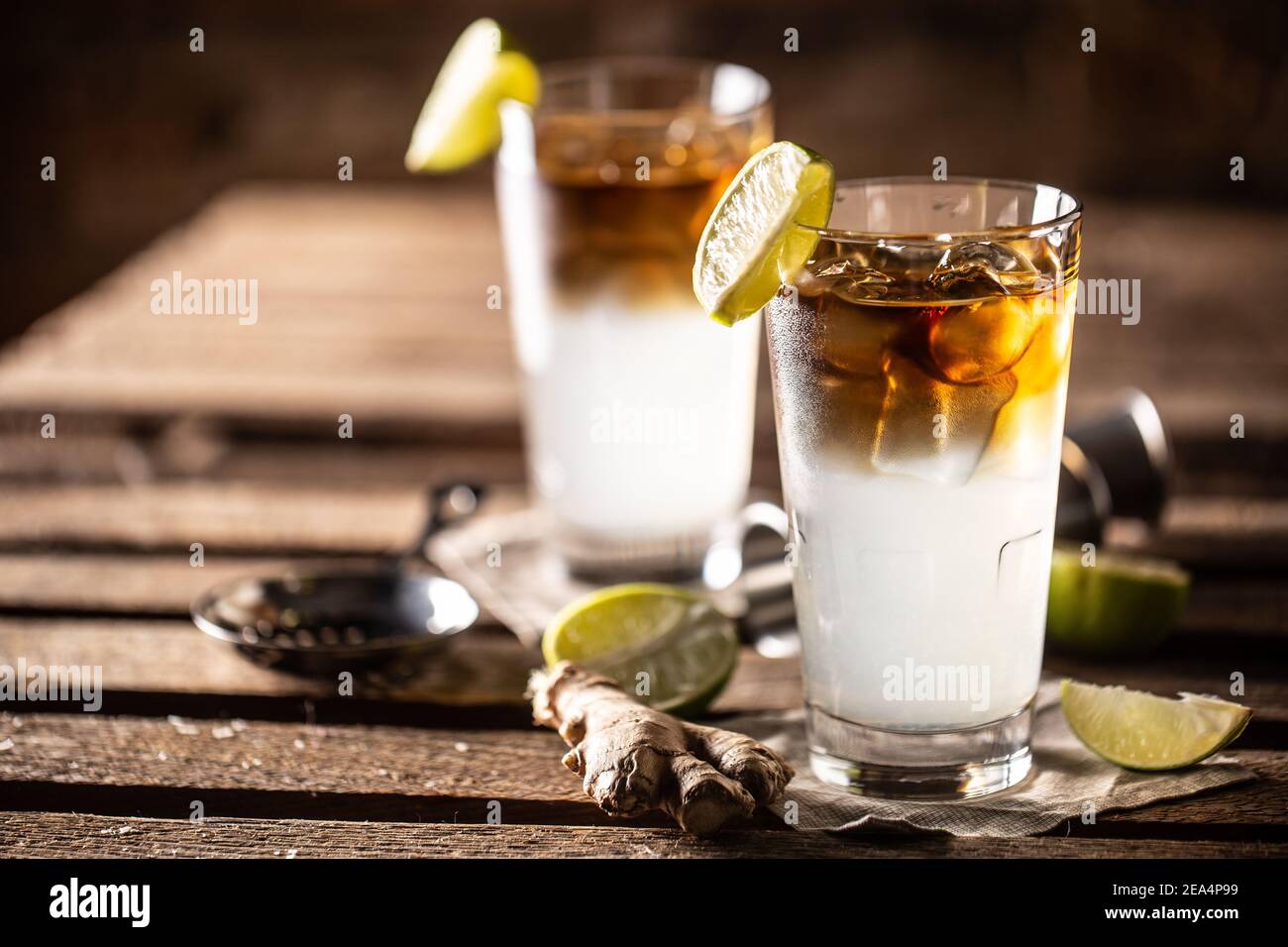 Dark n Stormy highball cocktail served as a long drink with rum, fresh lime juice, and ginger beer. Stock Photo