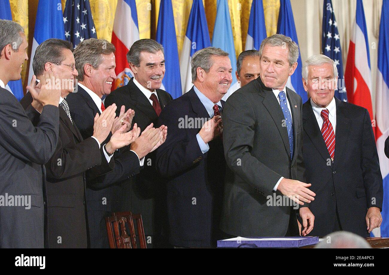 U.S. President W. Bush after he signed into law one of his administration's top priorities, the Dominican Republic-Central American Free Trade Agreement CAFTA (H.R. 3045), at the White House in Washington, D.C., USA, on Tuesday, August 2, 2005. The deal removes trade barriers with six countries and was narrowly approved by the House last week. Bush signed the bill in the East Room at the White House. Photo by Olivier Douliery/ABACAPRESS.COM Stock Photo