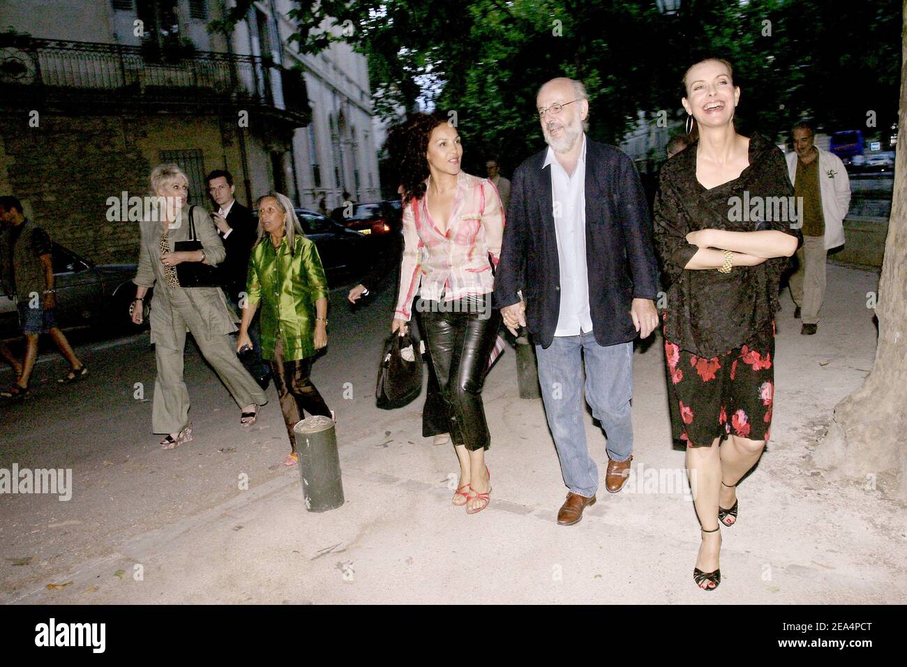 French director Bertrand Blier, his wife (L) and actress Carole Bouquet arrive to the festival 'A Director in the City' held in Nimes, southern France, on August 2, 2005, as part of a special tribute to Bertrand Blier and his father, the late actor Bernard Blier. Photo by Gerald Holubowicz/ABACAPRESS.COM. Stock Photo