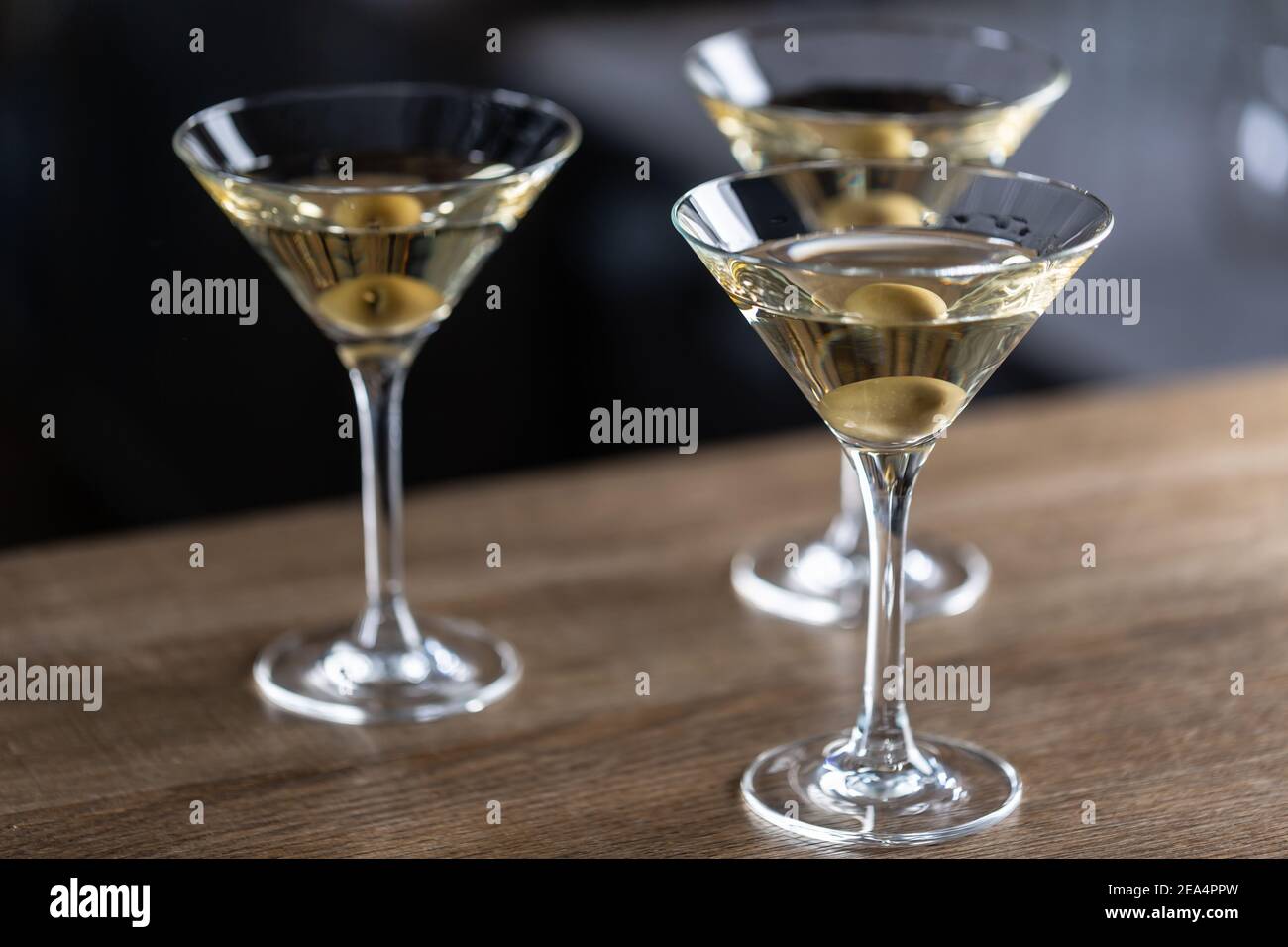 Dry Martini short drink cocktail with gin, dry vermouth and an olive