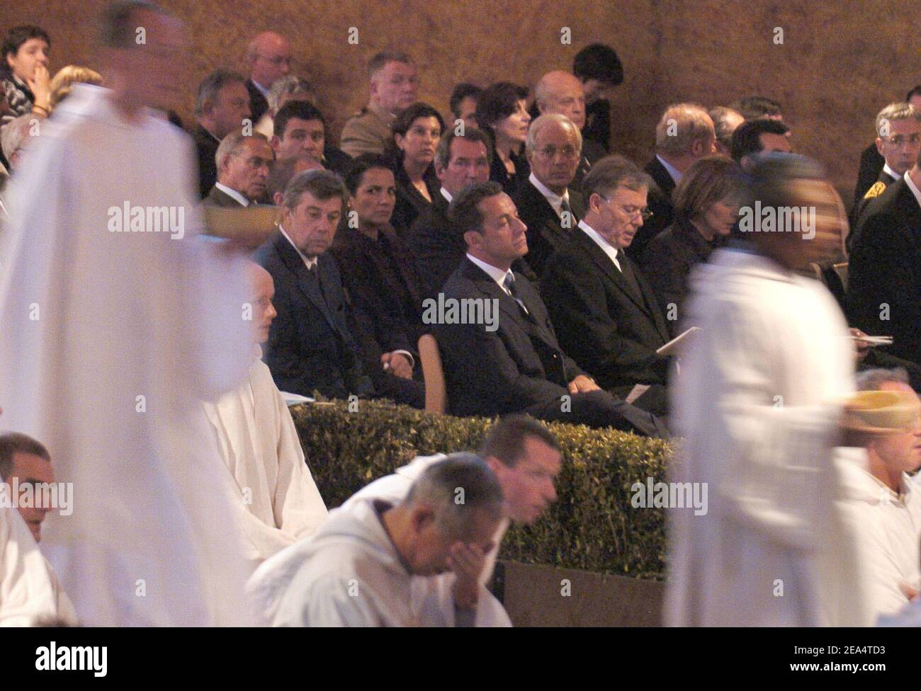 French Interior Minister Nicolas Sarkozy and German President Horst Koehler attend the funeral of Brother Roger Schutz, the leader of the Taize ecumenical community, held at the community's Reconciliation church in Taize, central France, on August 23, 2005. Brother Roger, 90, was slain last week when a 36-year-old mentally disturbed Romanian woman slit his throat in front of 2,500 pilgrims praying at the church. Photo by Bruno Klein/ABACAPRESS.COM Stock Photo