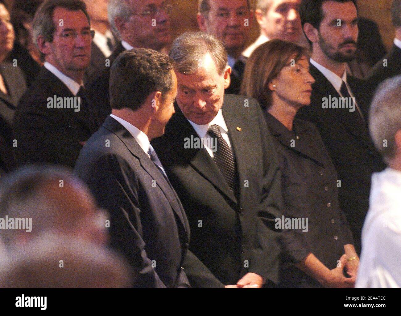 French Interior Minister Nicolas Sarkozy, German President Horst Koehler and his wife Eva attend the funeral of Brother Roger Schutz, the leader of the Taize ecumenical community, held at the community's Reconciliation church in Taize, central France, on August 23, 2005. Brother Roger, 90, was slain last week when a 36-year-old mentally disturbed Romanian woman slit his throat in front of 2,500 pilgrims praying at the church. Photo by Bruno Klein/ABACAPRESS.COM Stock Photo