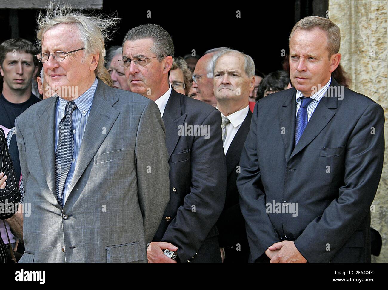 French actor Claude Rich (L) and French Minister of Culture Renaud Donnedieu de Vabres (R) attend the funeral of the late French actor Jacques Dufilho held at the cathedral of Mirande, southwestern France, on August 31, 2005. Dufilho died on August 28 aged 91. Photo by Patrick Bernard/ABACAPRESS.COM. Stock Photo