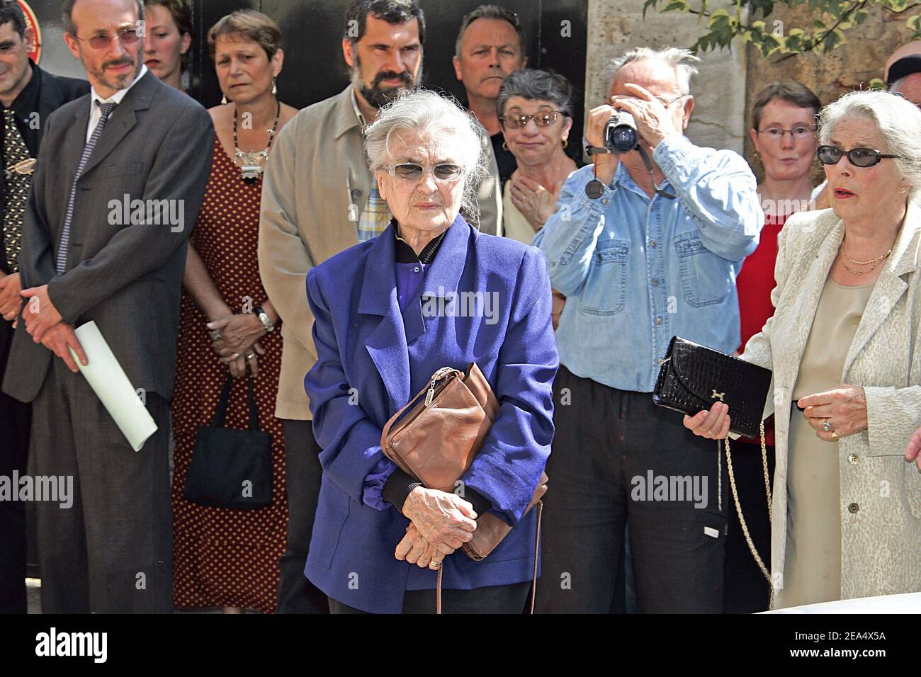 Jacques Dufilho's wife Colette leaves the funeral of the late French actor held at the cathedral of Mirande, southwestern France, on August 31, 2005. Dufilho died on August 28 aged 91. Photo by Patrick Bernard/ABACAPRESS.COM. Stock Photo