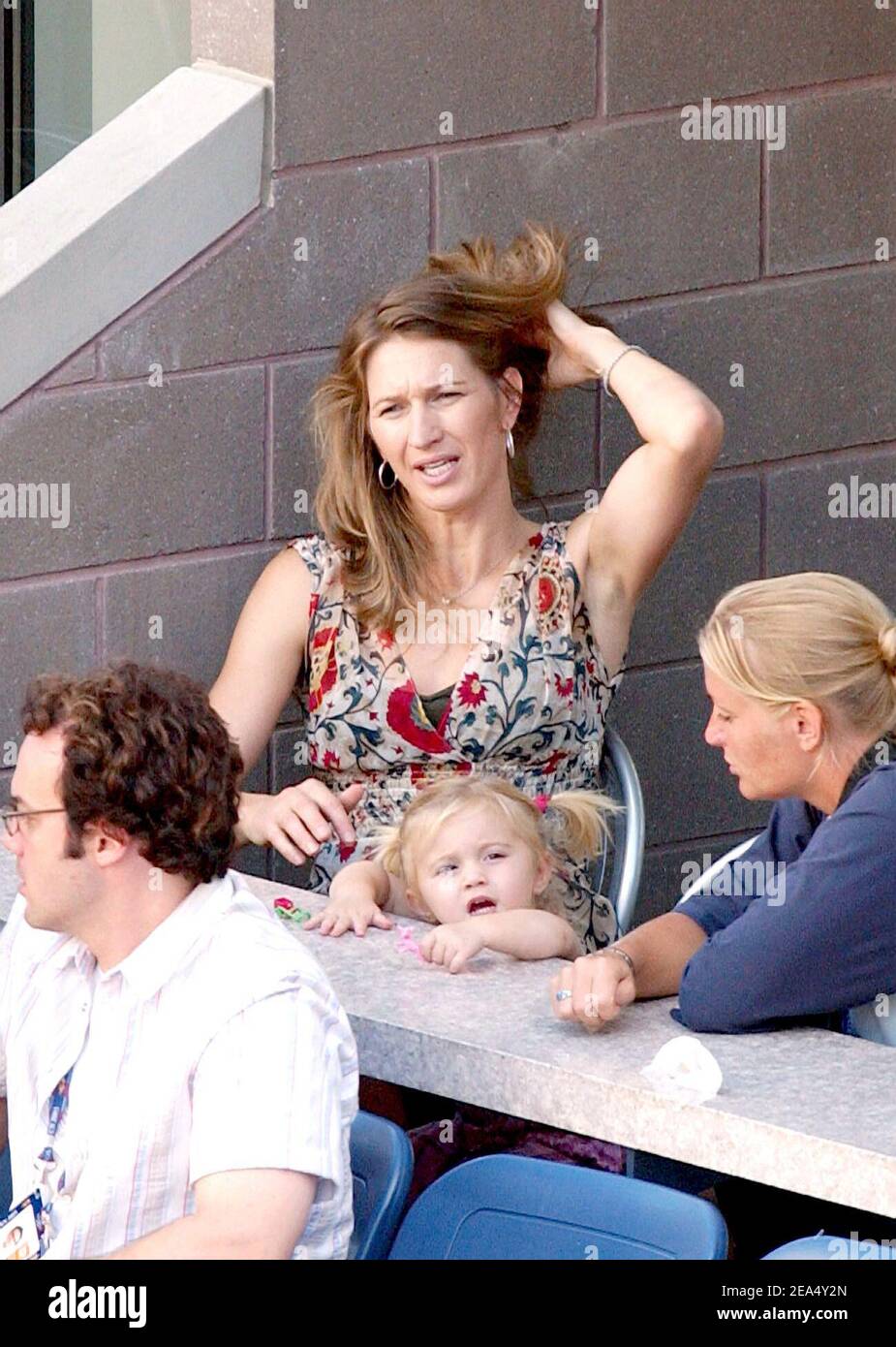Steffi Graf and her daughter Jaz Elle Agassi support Andre Agassi during  his 3rd round matchup at the 2005 US Open tennis tournament, held at the  Arthur Ashe Stadium in Flushing Meadows,
