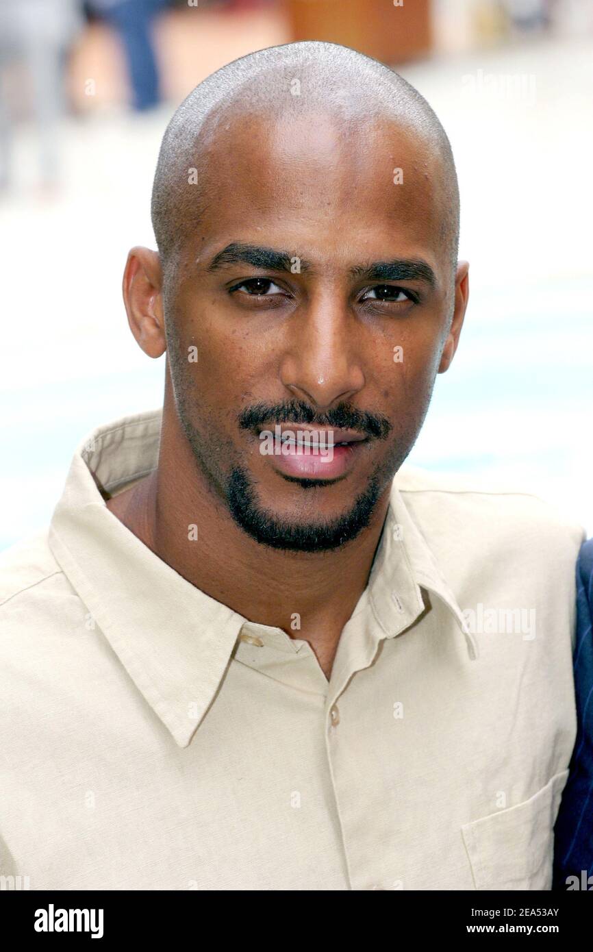 Stomy Bugsy poses during a photocall at the 7th Festival of TV fiction