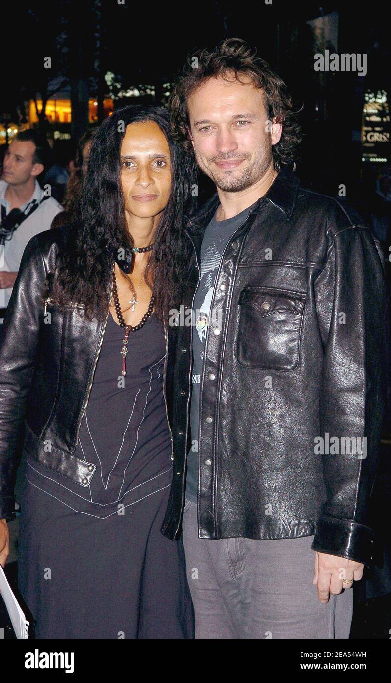 Swiss actor Vincent Perez and her wife Karine Sylla attend the French premiere of 'Revolver' directed by Guy Ritchie and produced by Luc Besson at the Gaumont Marignan in Paris, France, on September 23, 2005. Photo by Orban-Klein/ABACAPRESS.COM. Stock Photo
