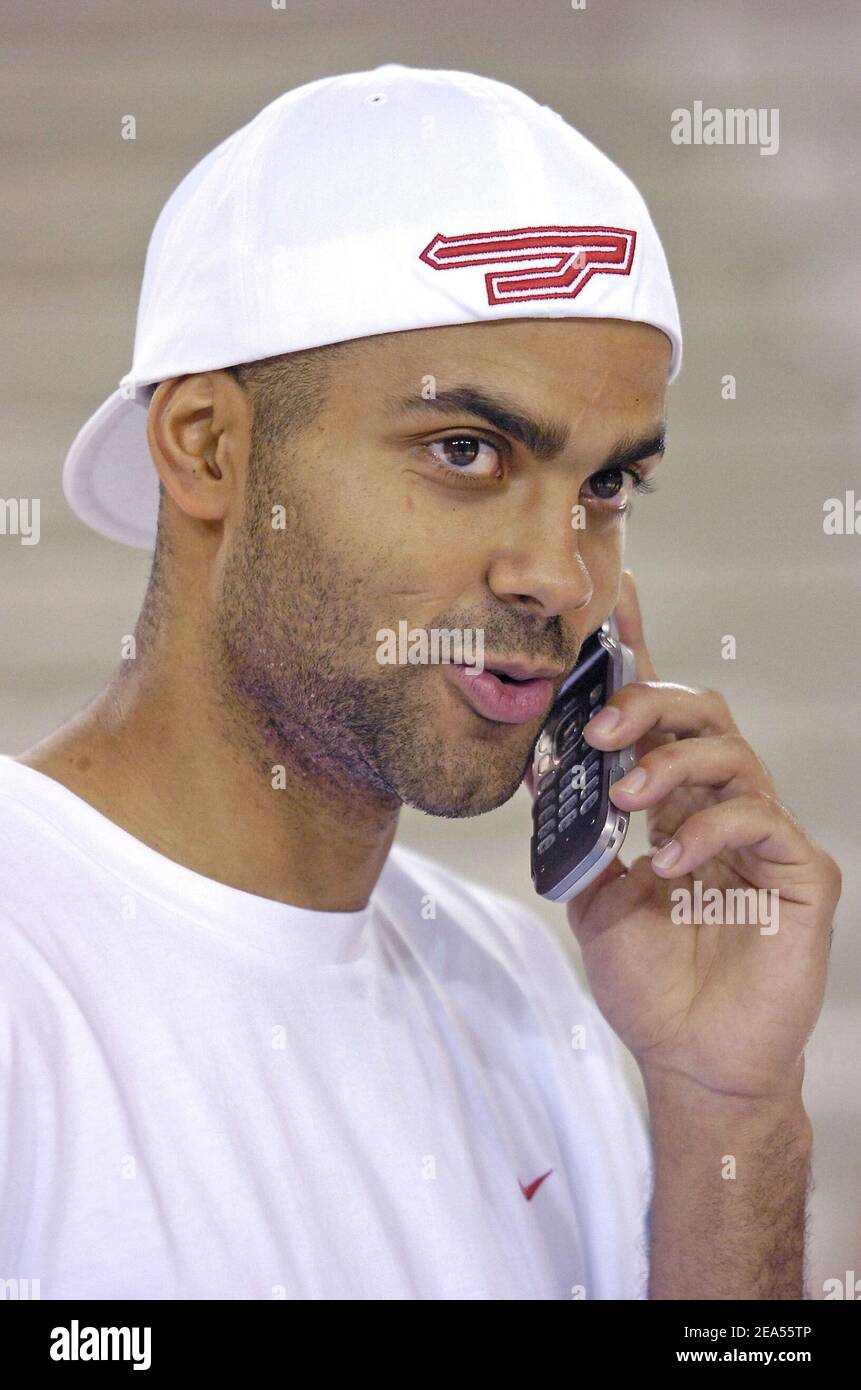 French basket player Tony Parker of San Antonio Spurs phones during a Powerade party in Issy-les-Moulineaux, near Paris, in France, on September 27, 2005. Photo by Nicolas Gouhier /CAMELEON/ABACAPRESS.COM Stock Photo