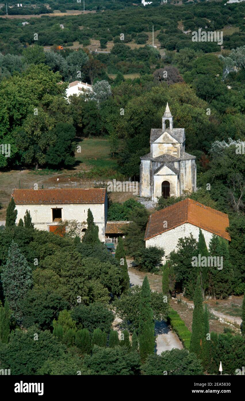 Abbaye de Montmajour Provence France View from Abbaye to Chapelle Ste-Croix Built as a Greek Cross 12th Century Funerary Chapel Was Built To Contain A Stock Photo
