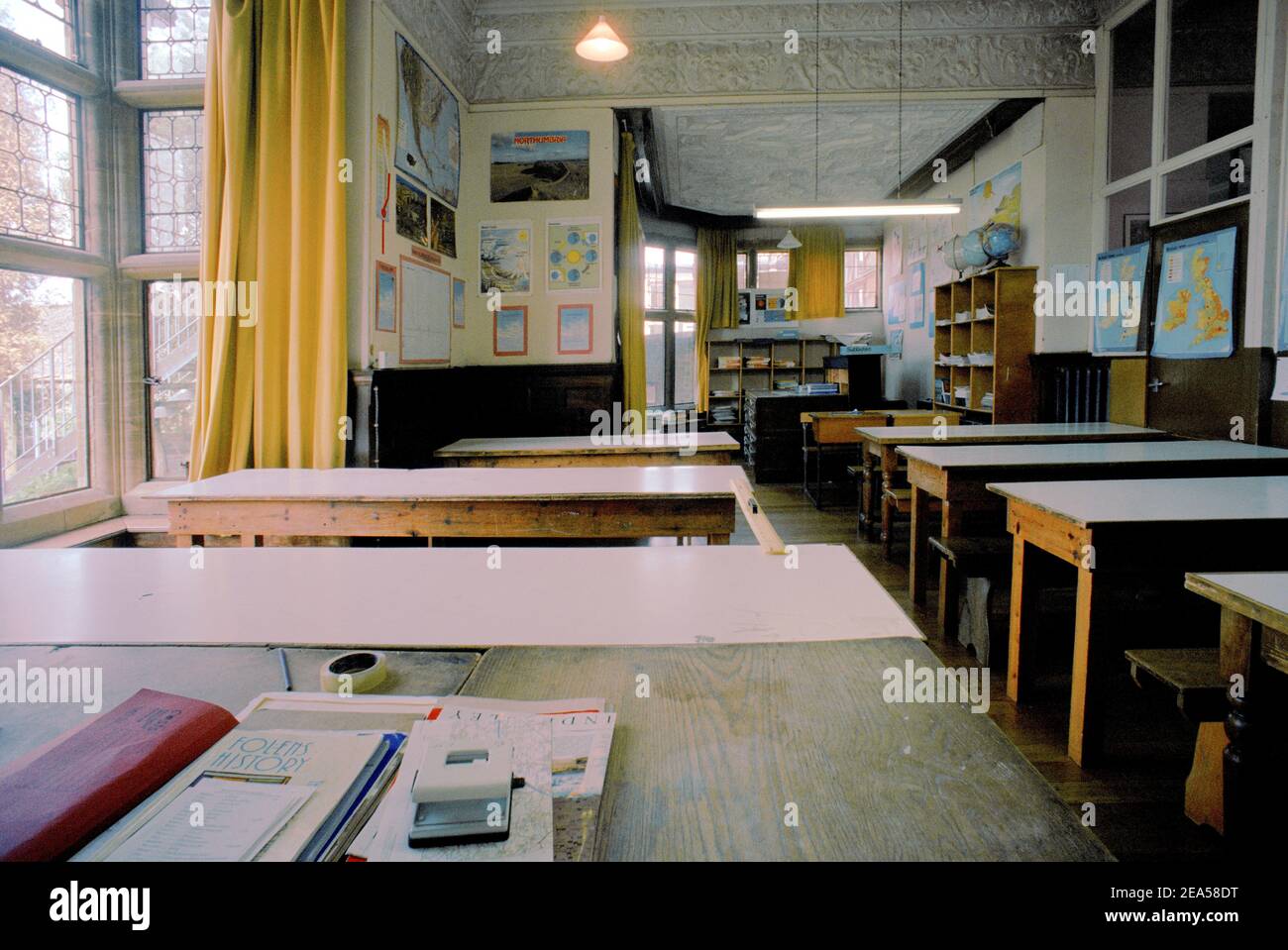 Old Empty Classroom with Desks Stock Photo