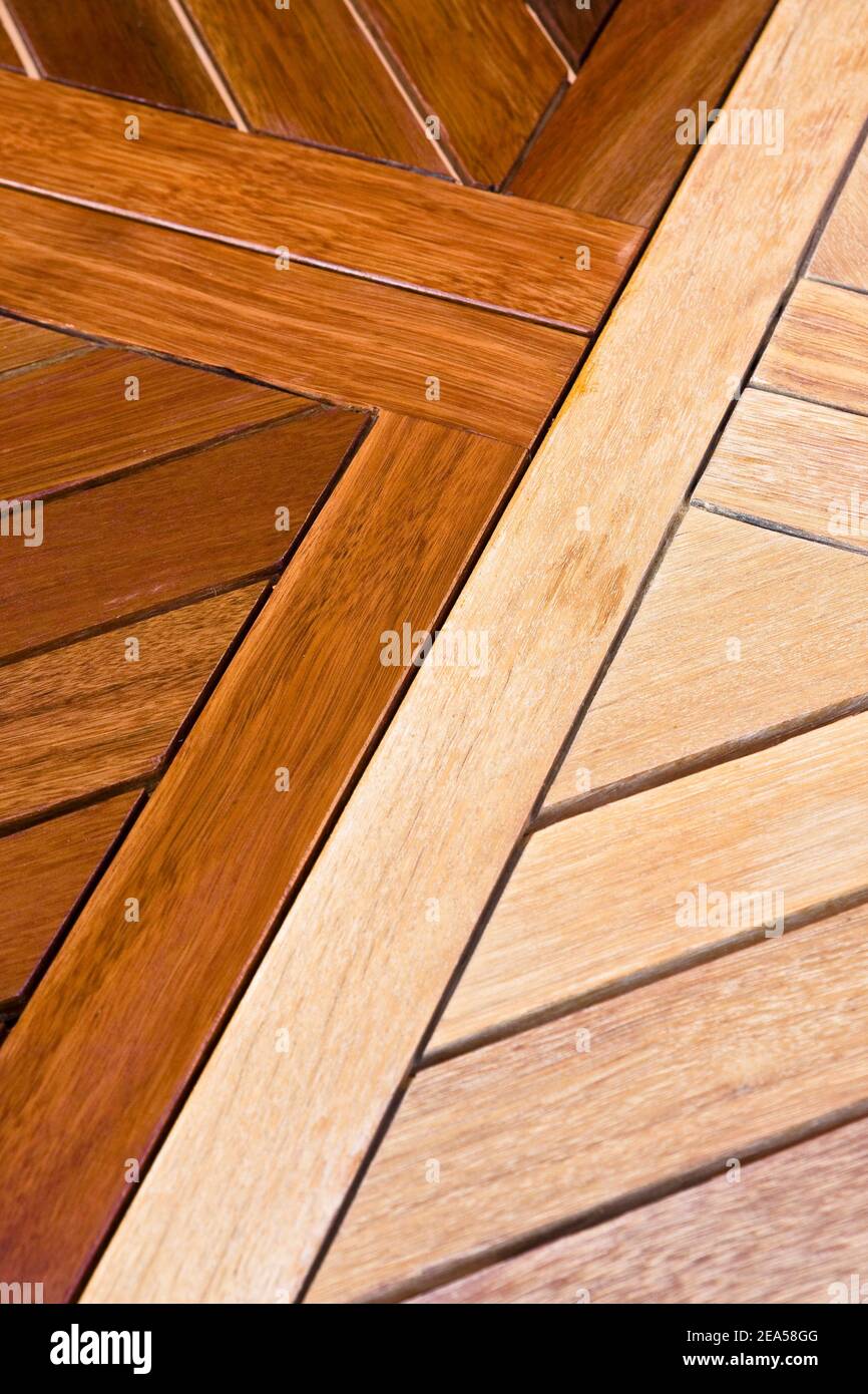 Staining wooden table. Before and after Stock Photo Alamy