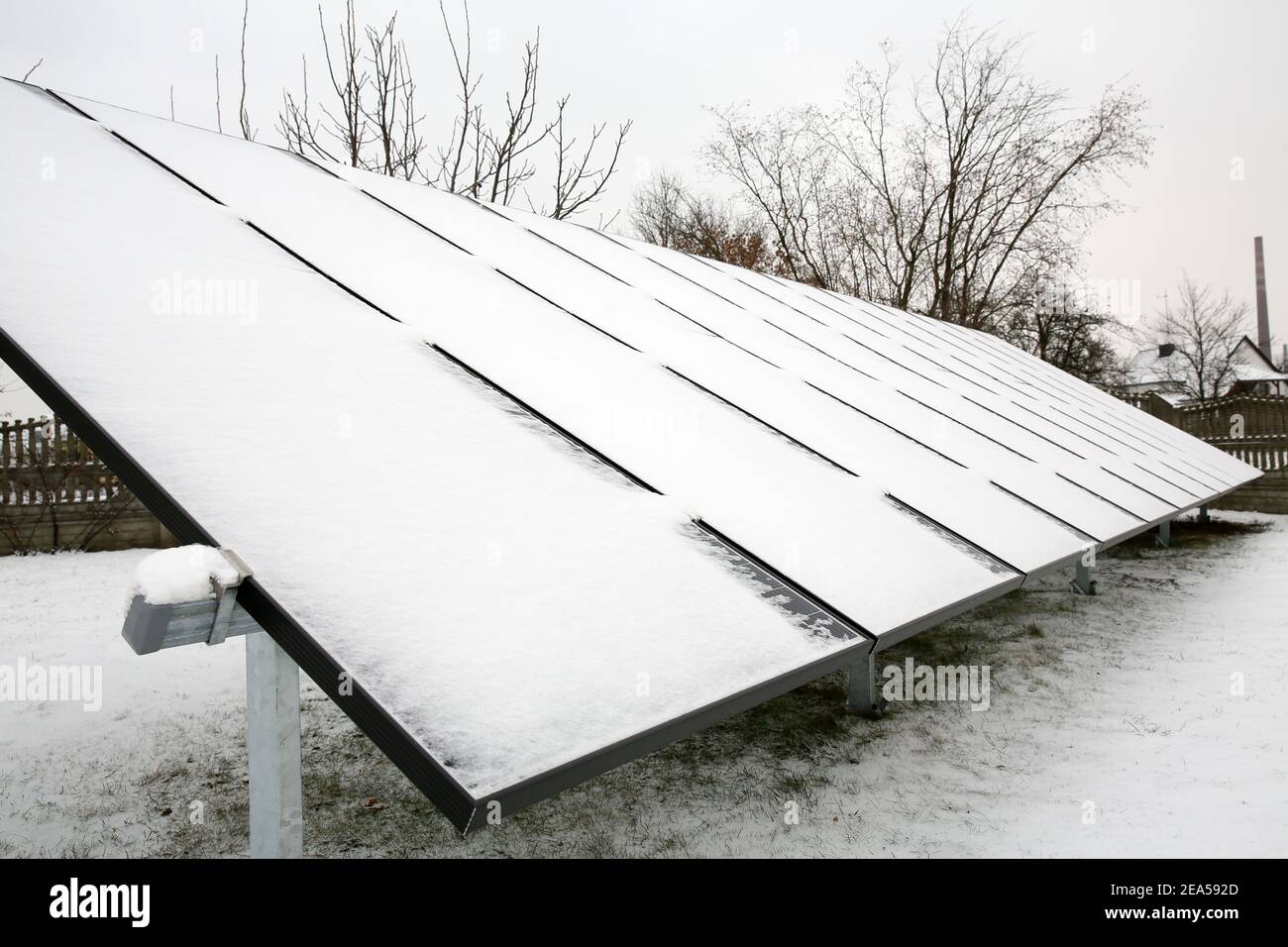 Photovoltaic panels covered with snow on a snowy day do not produce