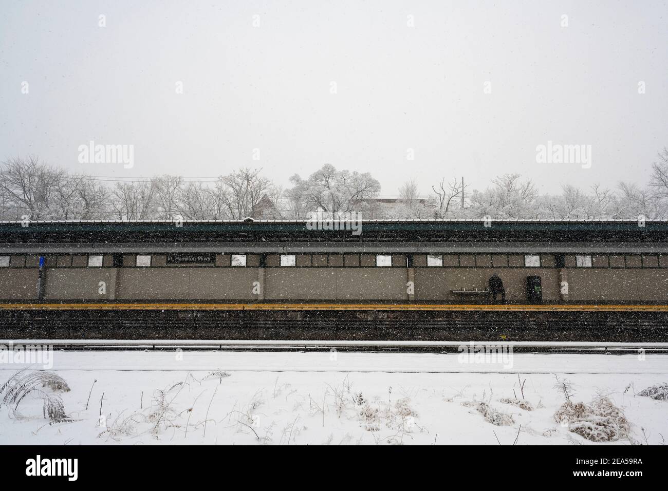 Brooklyn, New York, USA. 07 February 2021, Brooklyn, New York, USA Solitary figure waits for a subway train as New York City experiences second major winter storm in seven days Credit: Joseph Reid/Alamy Live News Stock Photo