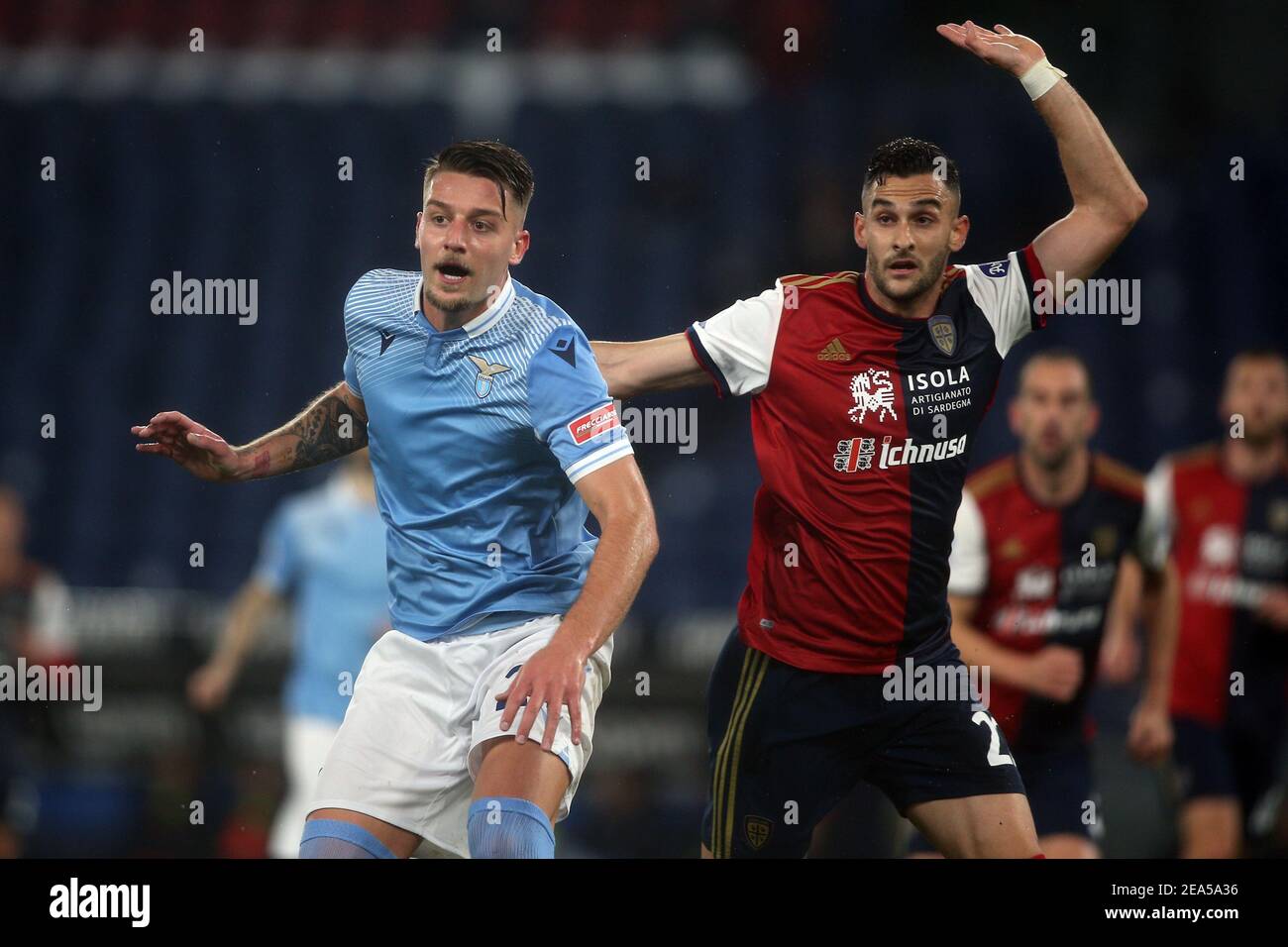 2/7/2021 - ROME, Italy. 07th Feb, 2021. Milinkovic-Savic (LAZIO) C.LYKOGIANNIS (CAGLIARI) in action during the Italian Serie A league 2021 soccer match between SS LAZIO VS CAGLIARI, at Olympic stadium in Rome (Photo by IPA/Sipa USA) Credit: Sipa USA/Alamy Live News Stock Photo
