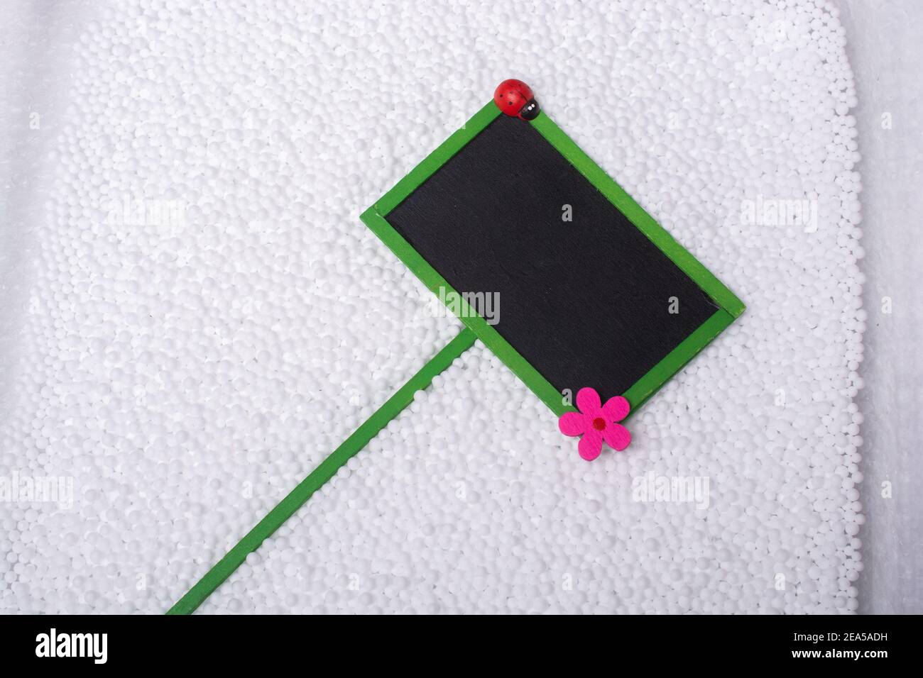 Black Empty Sign Board with floral icon Stock Photo - Alamy