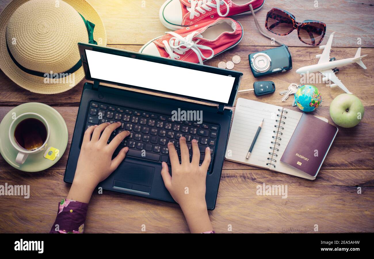 Planning a trip laptop map hi-res stock photography and images - Alamy