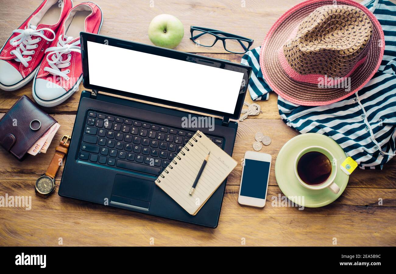 Planning a trip laptop map hi-res stock photography and images - Alamy