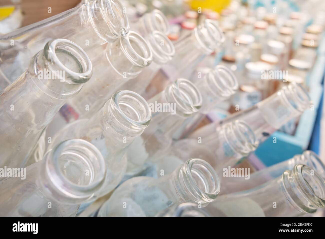 Empty glass bottles collected for recycling close-up Stock Photo