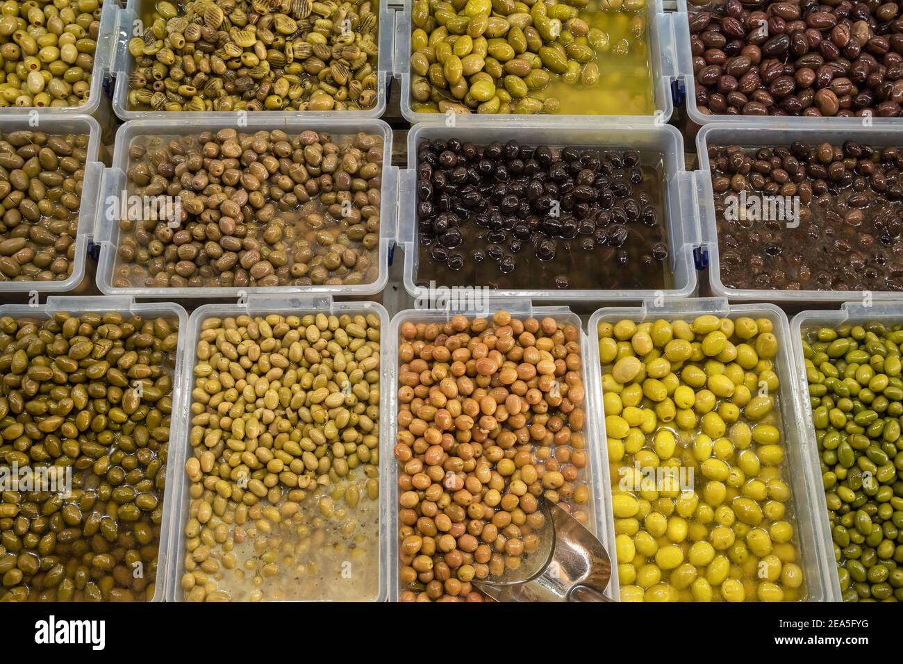 Different types of olives at street market Stock Photo