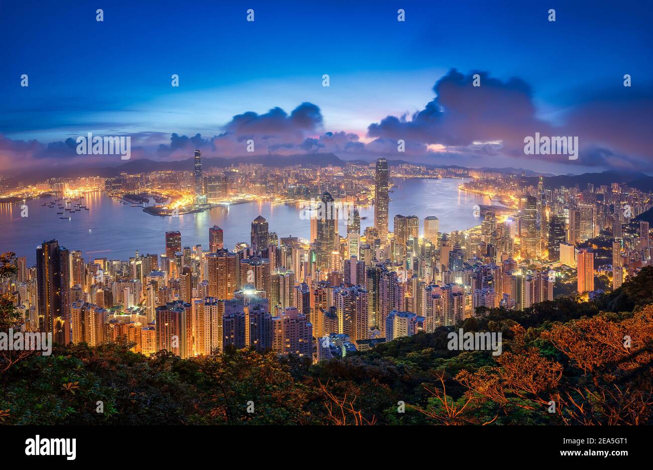 Hong Kong city skyline at sunrise view from Peak mountain Stock Photo