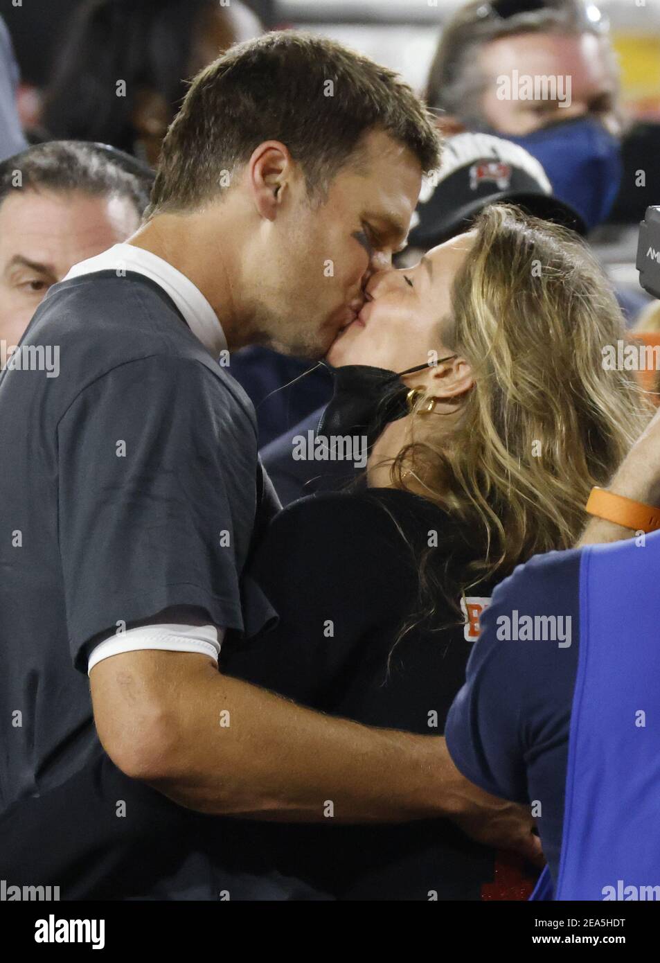 Tampa, United States. 07th Feb, 2021. Tampa Bay Buccaneers quarterback Tom Brady  kisses his wife Gisele Bundchen as he celebrates his Super Bowl LV victory  over the Kansas City Chiefs at Raymond