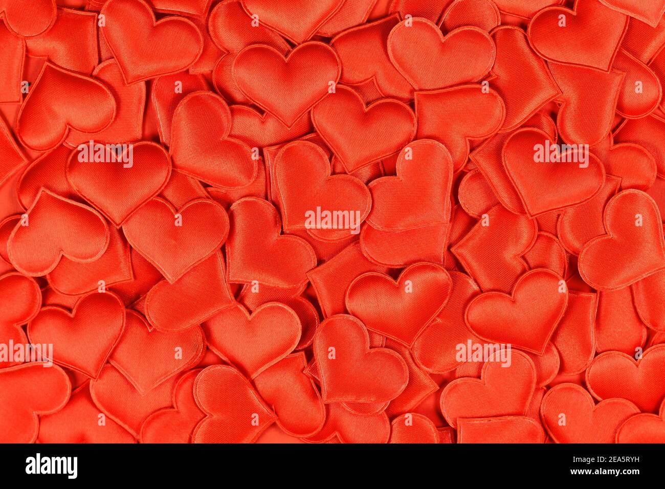 Red heart shaped confetti background Stock Photo - Alamy