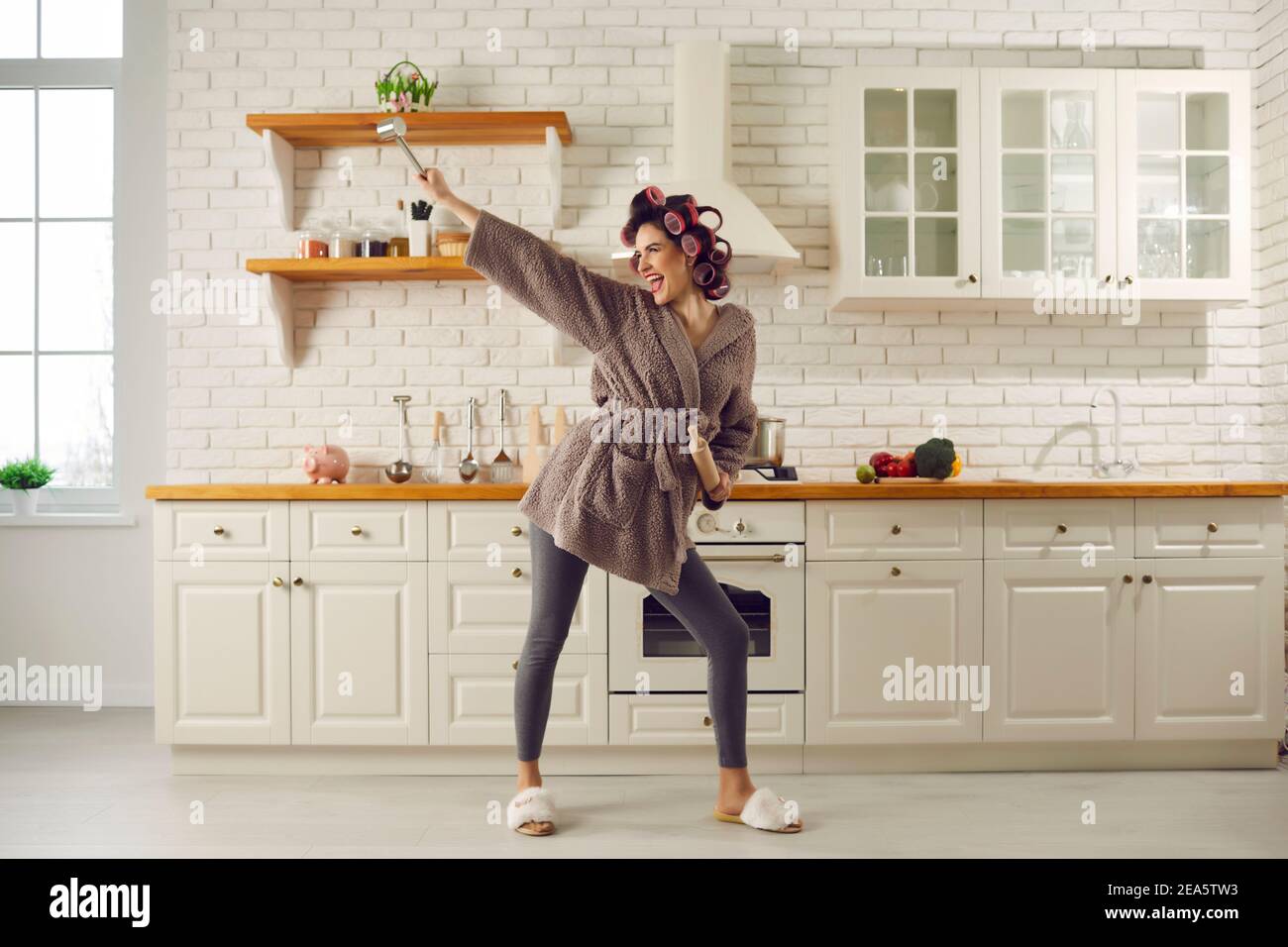 music video with girl dancing on kitchen table