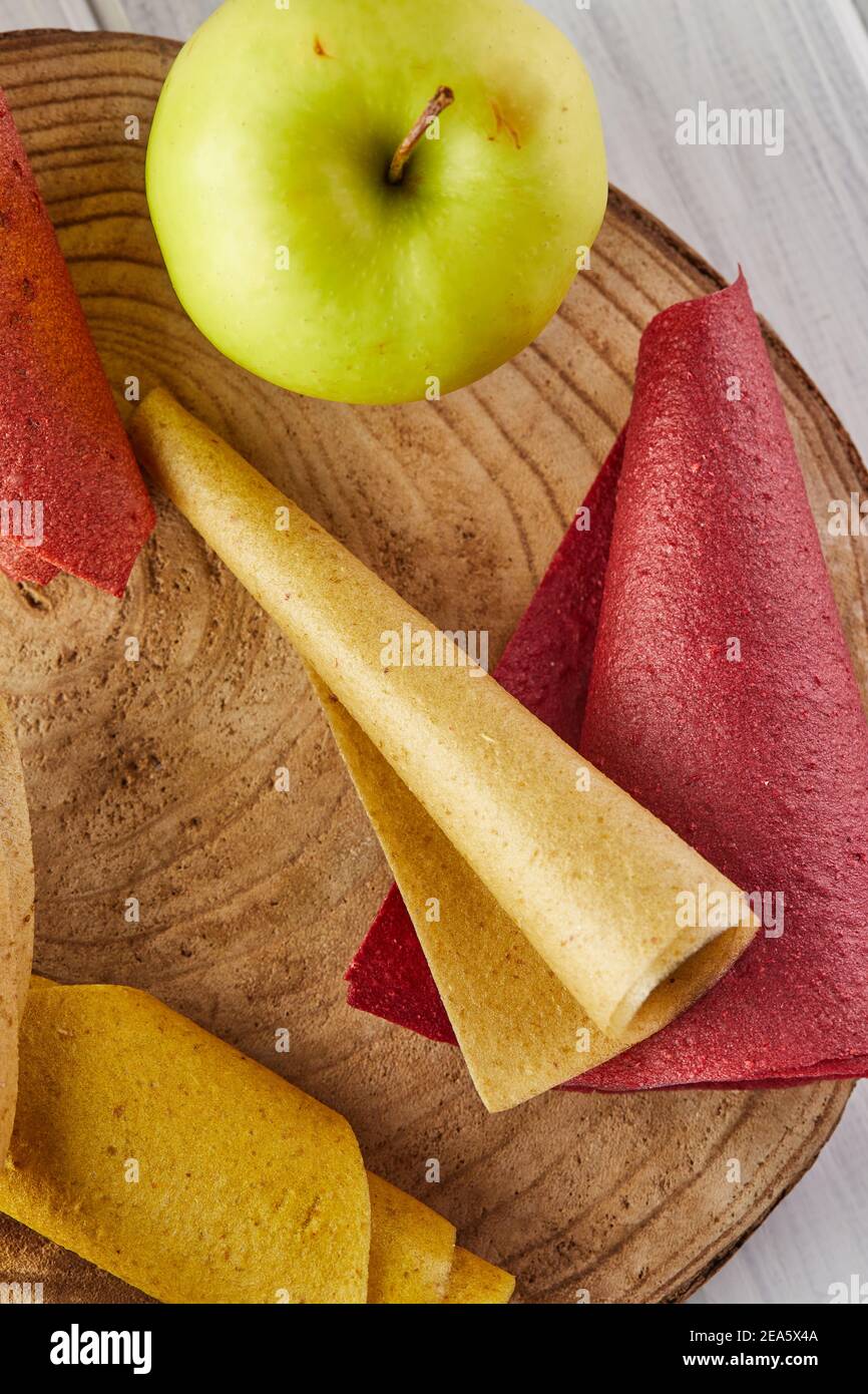 Sweet pure fruit pastille in rolls. Healthy sweets lozenges, fruit