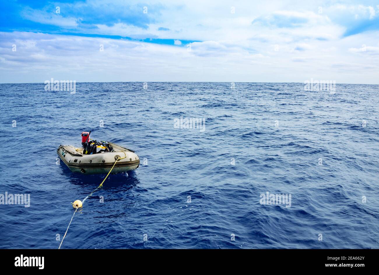 Inflatable diving boat in the ocean prepared for dive with tanks and equipment Stock Photo Alamy