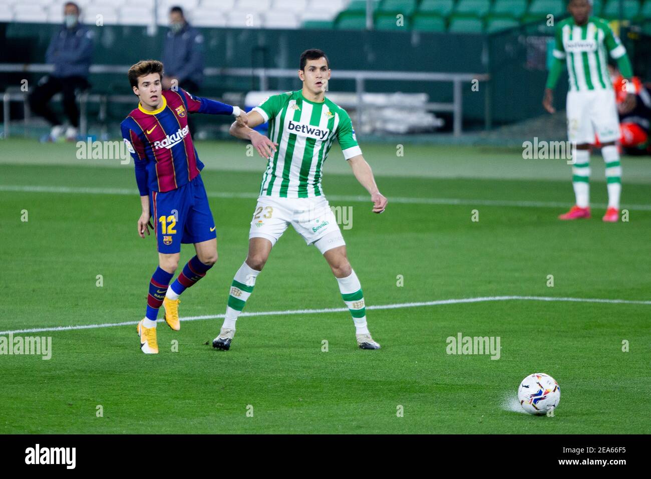 Riqui Puig of Barcelona and Aissa Mandi of Real Betis during the Spanish championship La Liga football match between Real Be / LM Stock Photo