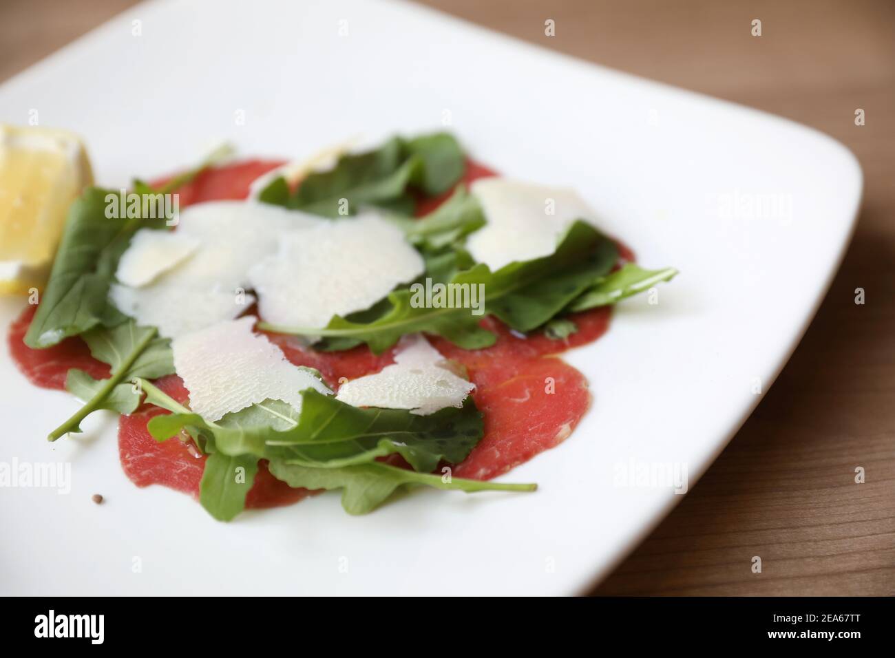Beef Carpaccio cold appetizer with parmesan cheese italian food Stock