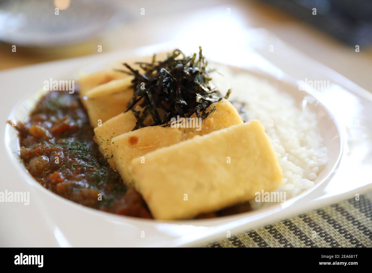 Curry rice with tofu japanese food Stock Photo - Alamy