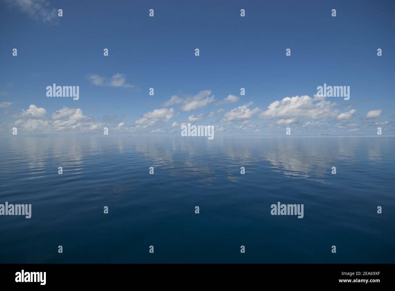 reflections from the sky in the maldives Stock Photo - Alamy