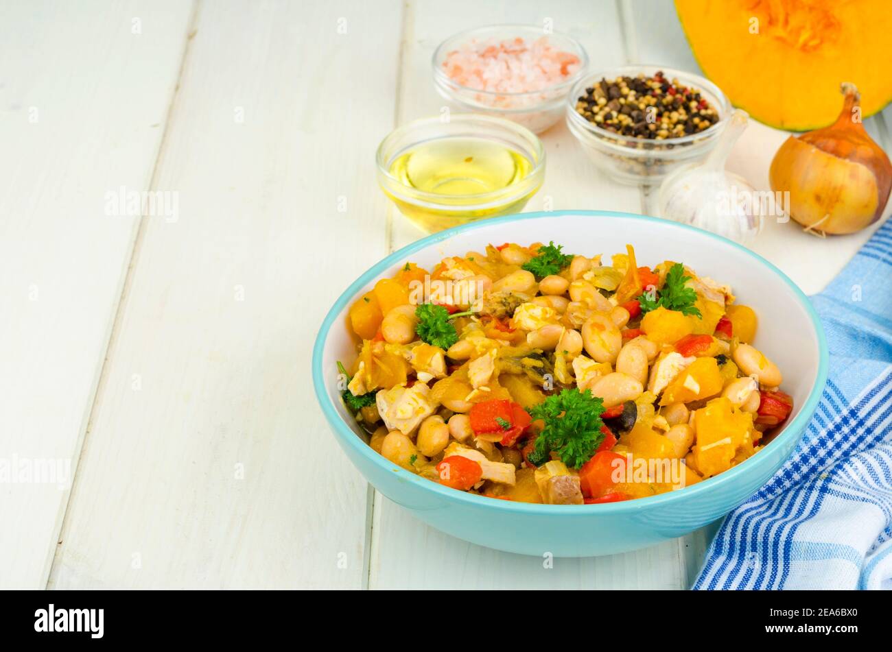 Stewed vegetables with pumpkin, meat and beans. Studio Photo Stock