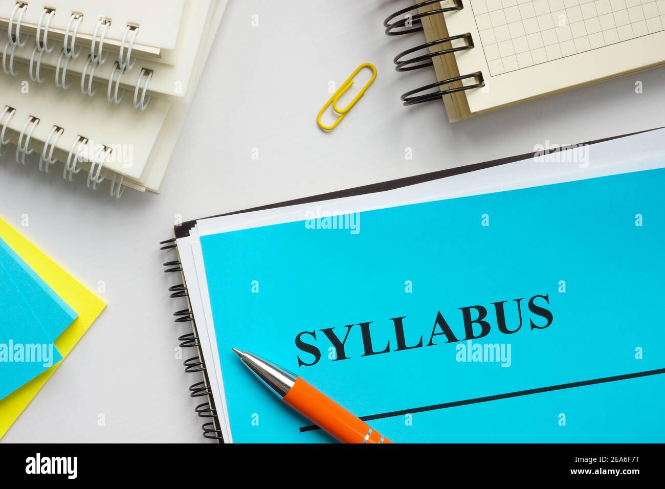 Syllabus educational plan and papers on the desk Stock Photo Alamy